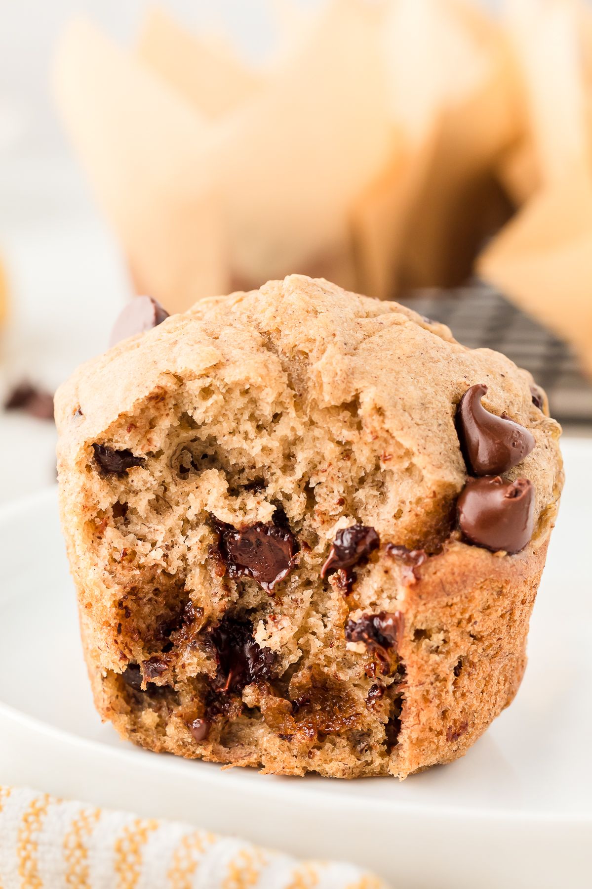 Banana chocolate chip muffin with a bite taken out