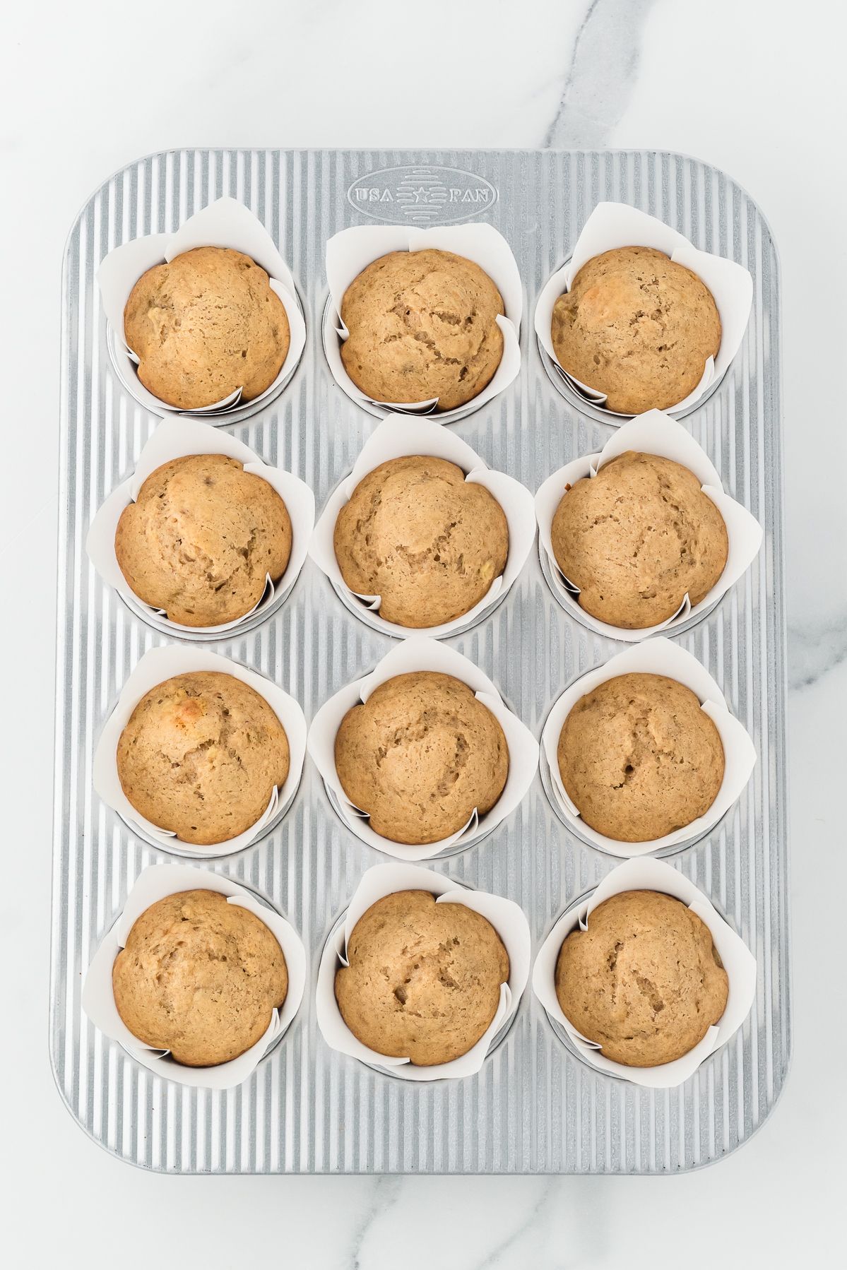 Baked banana muffins in the muffin tin