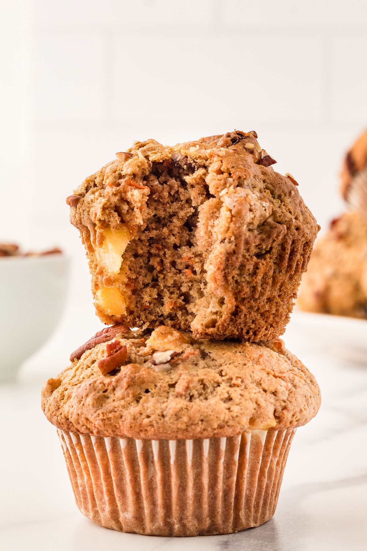 Gluten free morning glory muffin with a bite taken out