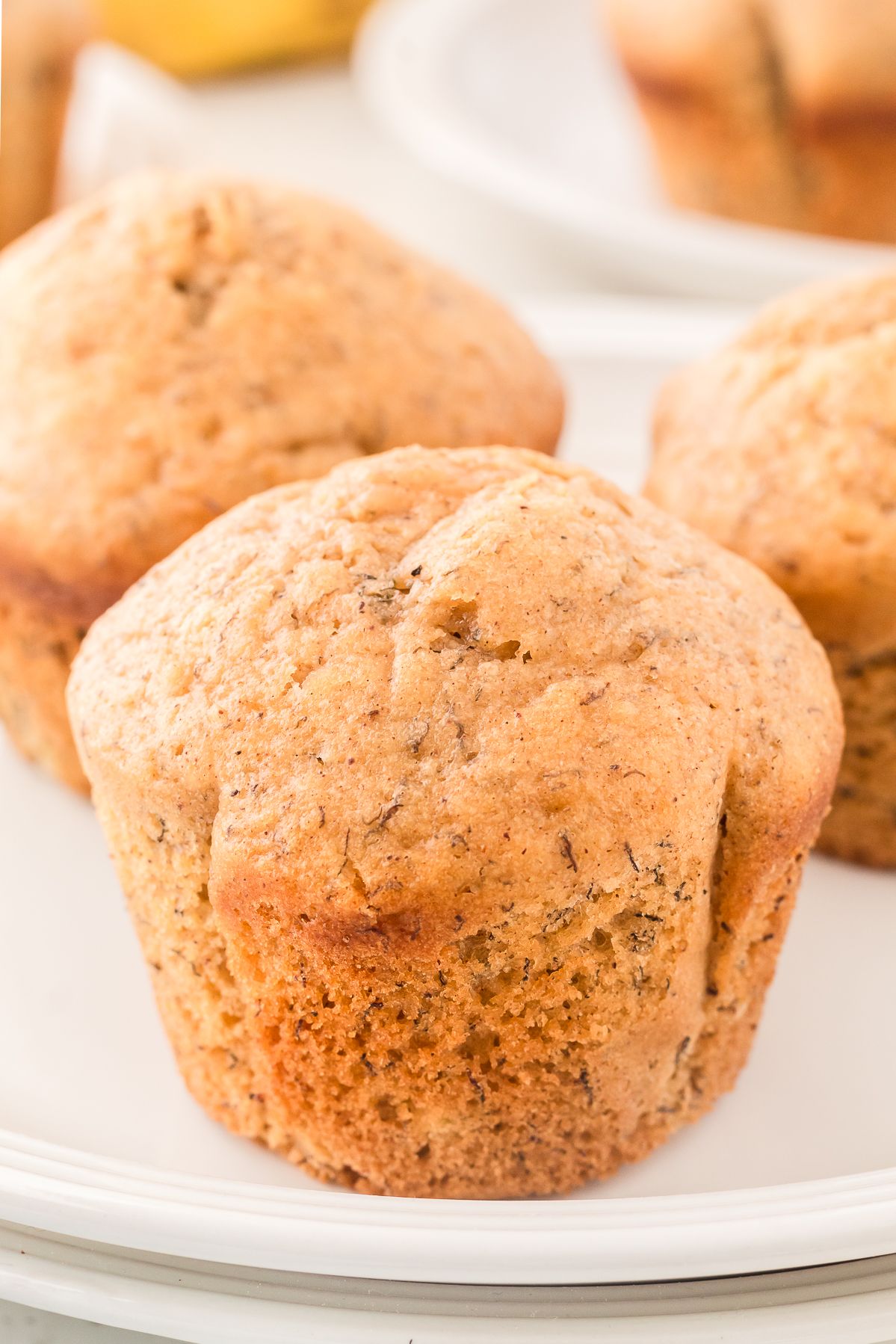 Close up of a tall healthy banana muffin
