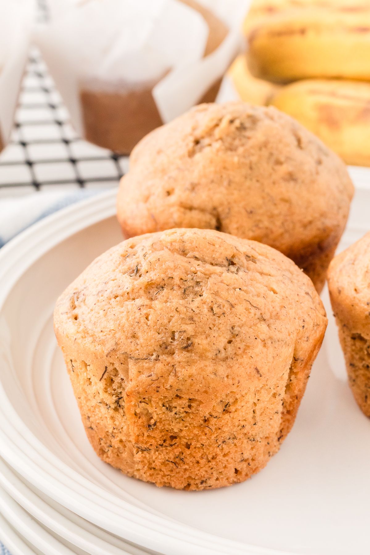 Healthy banana muffins on a white plate