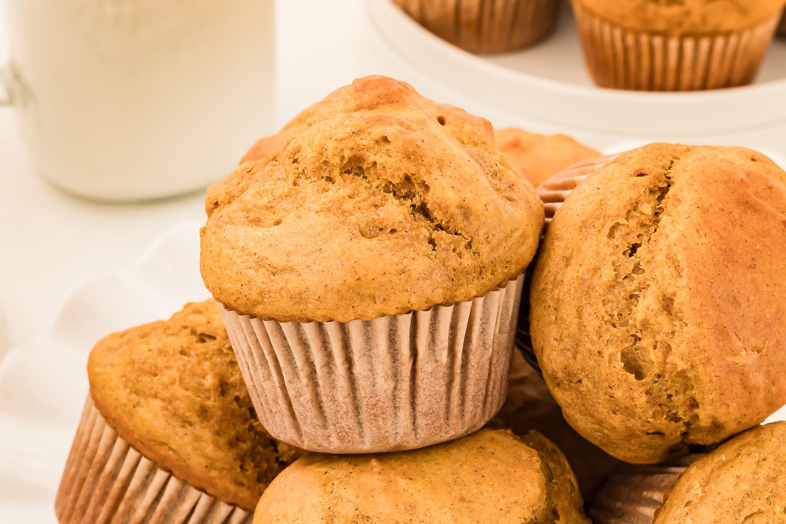 Healthy pumpkin muffins grouped together on a plate