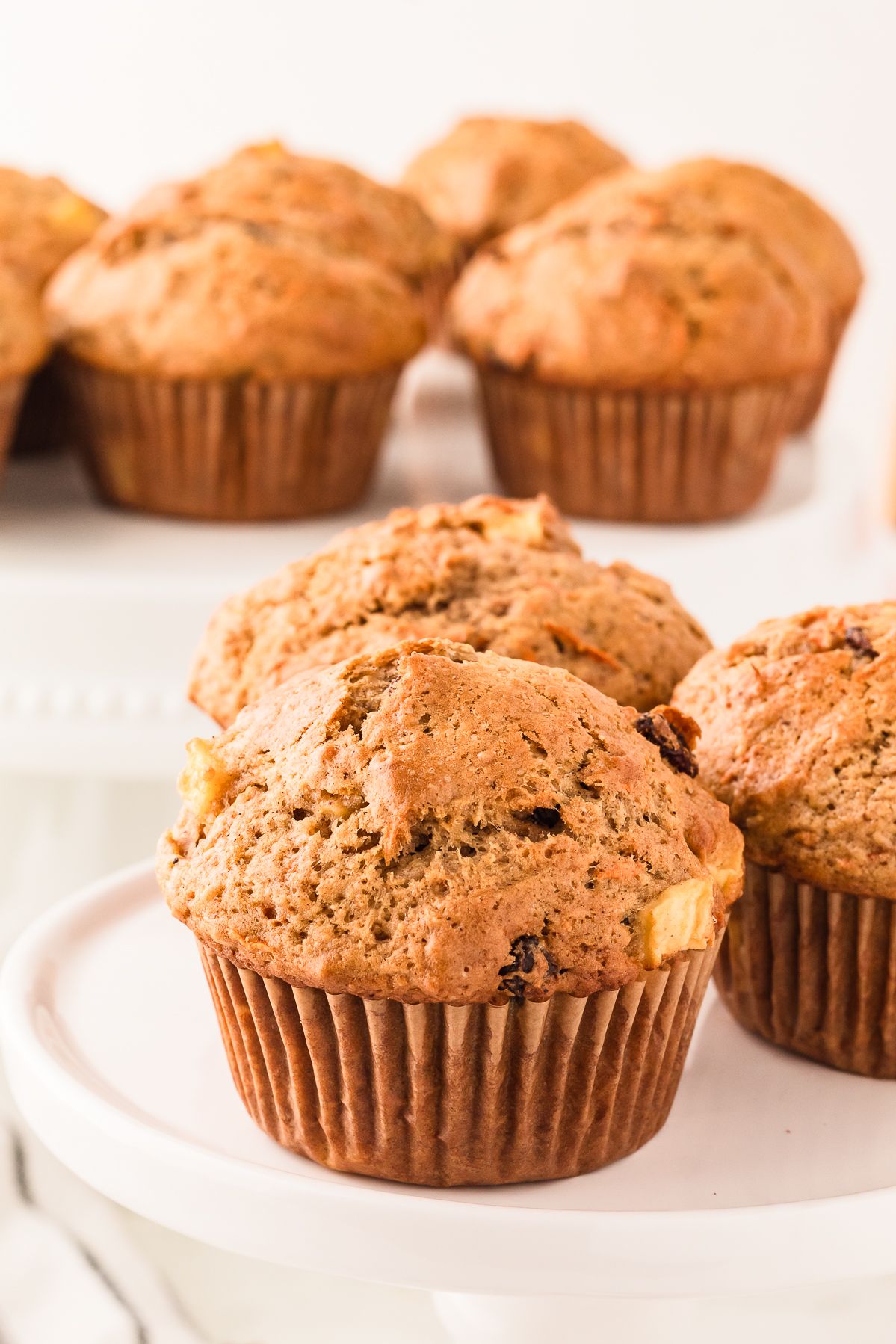 Morning glory muffins on a white cake stand