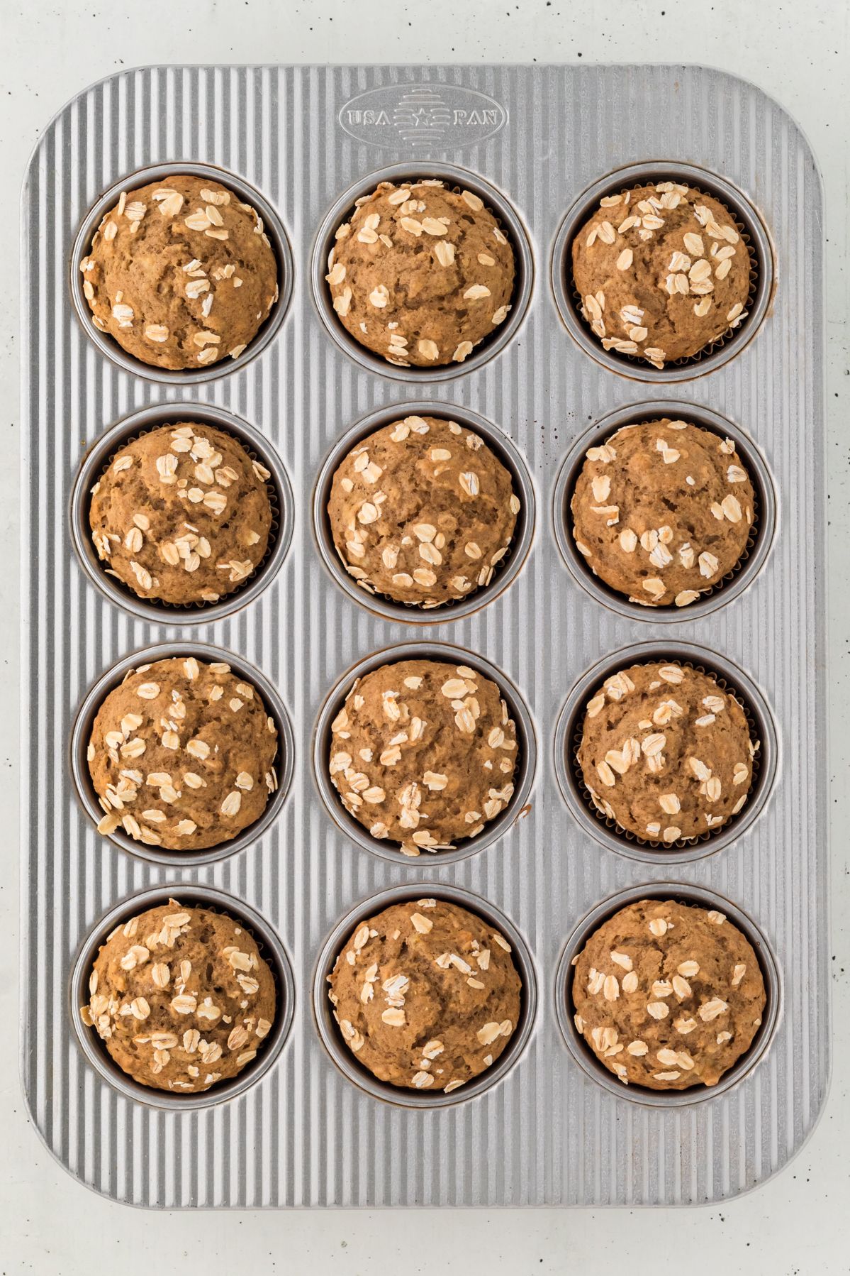 Baked banana oatmeal muffins in the muffin tin