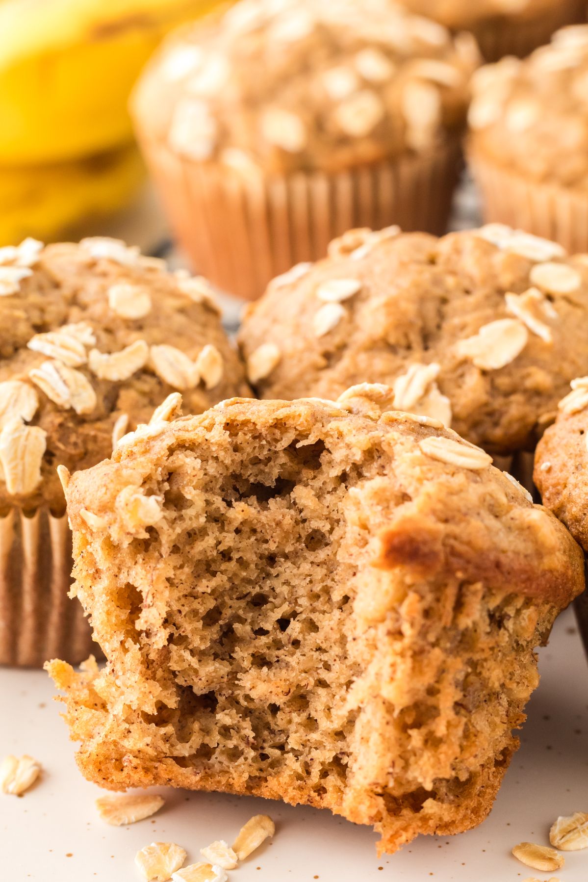 Banana oatmeal muffin with a bite taken out